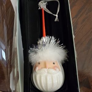 Santa ornament with tinsel and sparkles